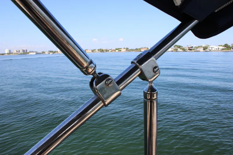 Slide: The Image of 2019 Formula 270 Bowrider boat railing with scenic water view. - 20