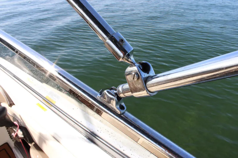 Slide: The Image of Close-up of 2019 Formula 270 Bowrider railing over water. - 21