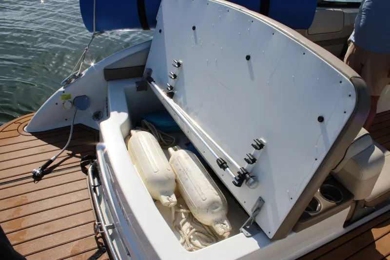 Slide: The Image of 2019 Formula 270 Bowrider storage compartment with fenders and ropes on deck. - 9