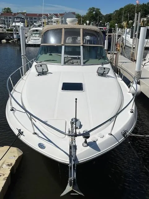 Slide: The Image of 2000 Sea Ray Cruiser 310 Sundancer docked at marina. - 1