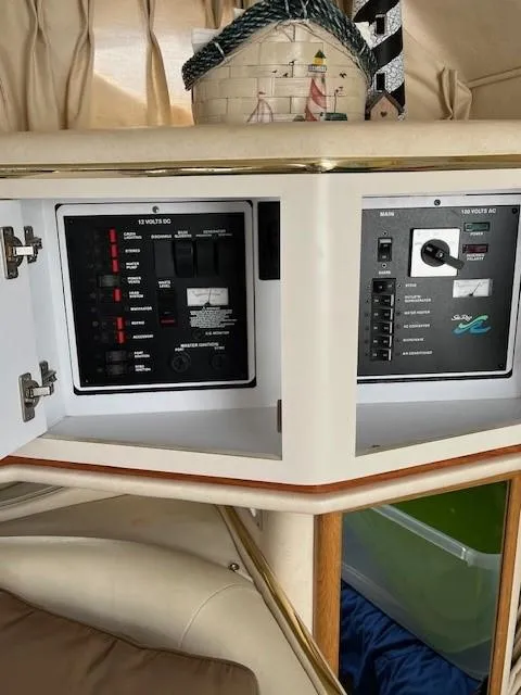 Slide: The Image of Control panel inside 2000 Sea Ray Cruiser 310 Sundancer yacht cabin. - 11