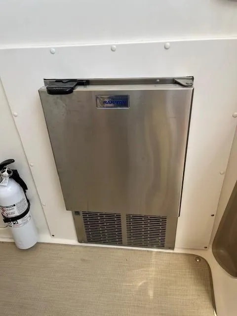 Slide: The Image of Stainless steel refrigerator on 2000 Sea Ray Cruiser 310 Sundancer yacht. - 20