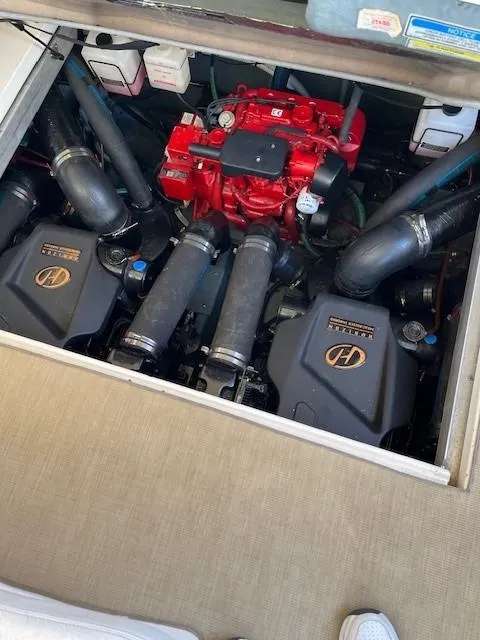 Slide: The Image of Engine compartment of 2000 Sea Ray Cruiser 310 Sundancer with dual engines. - 21