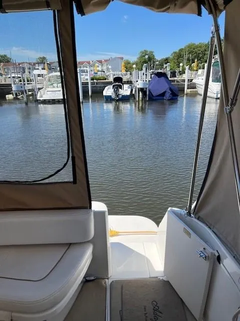 Slide: The Image of 2000 Sea Ray Cruiser 310 Sundancer docked at marina, interior view. - 4