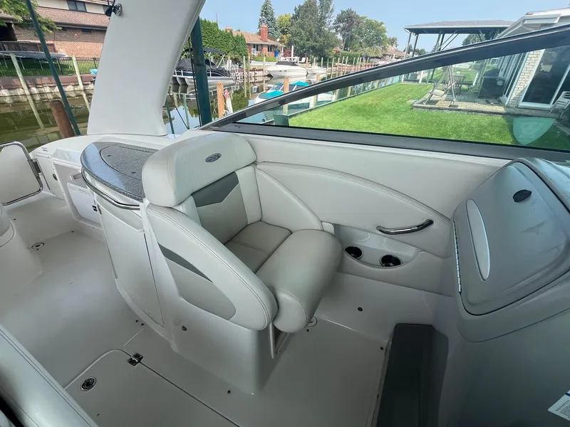 Slide: The Image of 2010 Chaparral 275 SSi boat interior with plush seating and sleek design. - 10