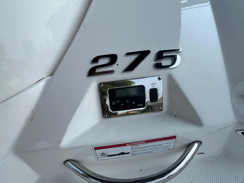 Slide: The Image of 2010 Chaparral 275 SSi boat detail with model number and control panel. - 19