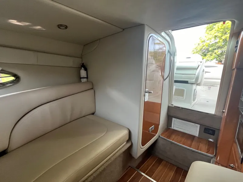 Slide: The Image of Interior of 2010 Chaparral 275 SSi boat with seating and wooden flooring. - 25