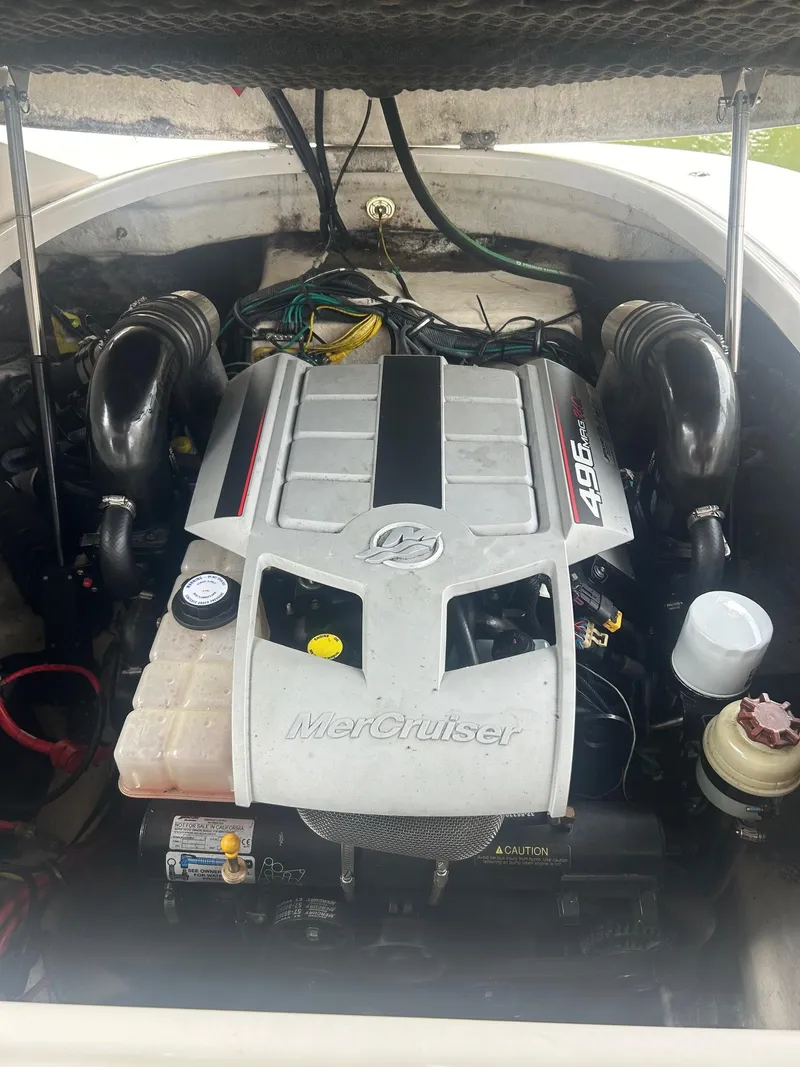 Slide: The Image of 2010 Chaparral 275 SSi engine compartment with MerCruiser 496 motor. - 30