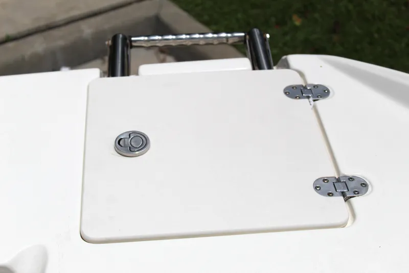 Slide: The Image of 2017 NauticStar 243DC Sport Deck boat hatch with stainless steel hinges. - 47