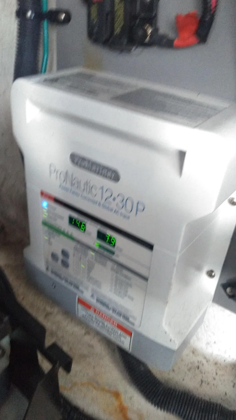 Slide: The Image of ProMariner ProNautic 1230P charger in 2014 Sea Ray 300 SLX boat. - 27