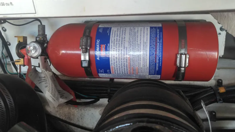 Slide: The Image of Automatic fire extinguisher system in 2014 Sea Ray 300 SLX boat engine compartment. - 28
