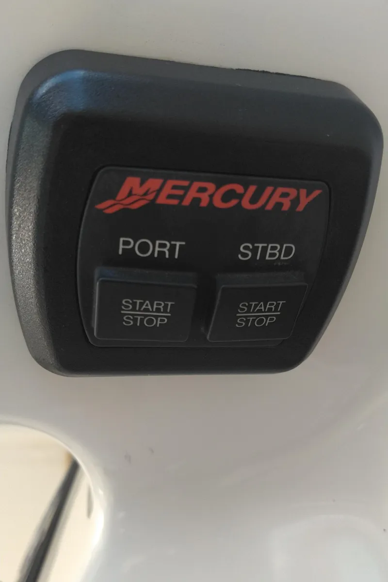 Slide: The Image of Mercury engine control panel on 2014 Sea Ray 300 SLX boat. - 38