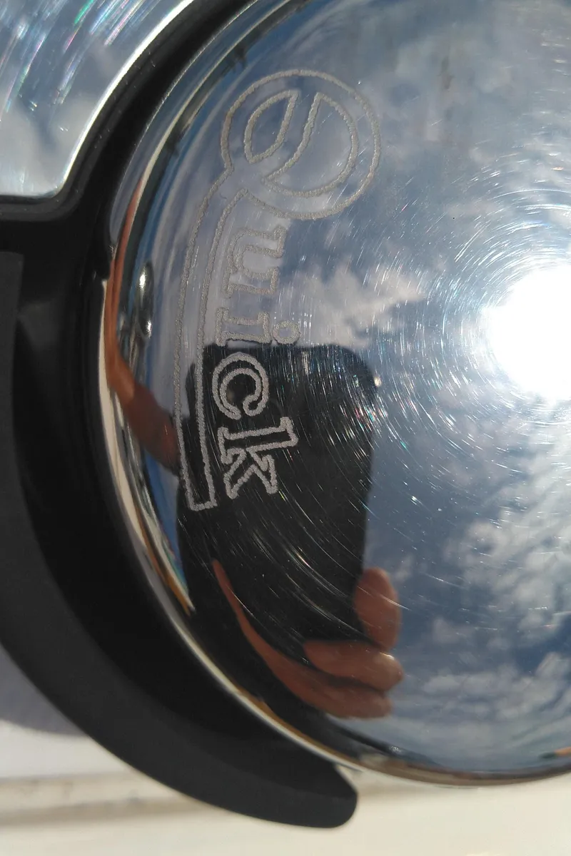Slide: The Image of Close-up of a reflective surface on a 2014 Sea Ray 300 SLX boat. - 41
