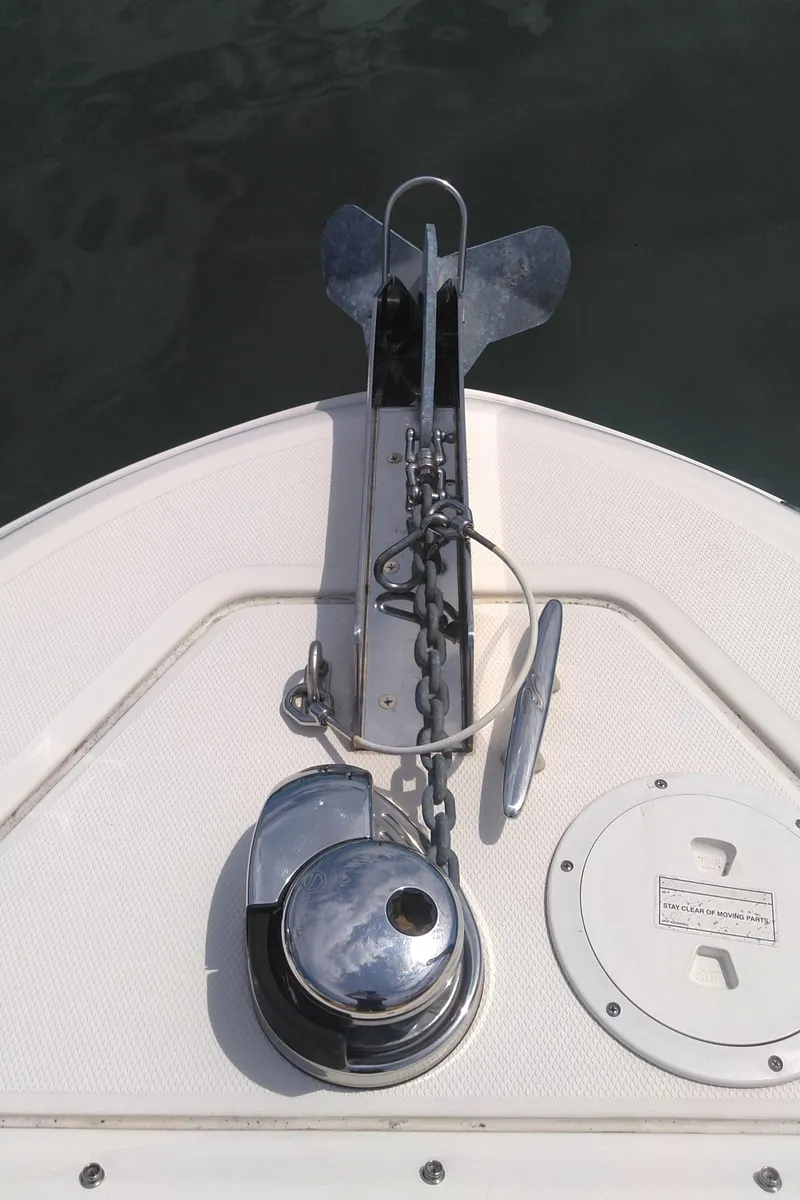 Slide: The Image of 2014 Sea Ray 300 SLX boat anchor and winch system on deck. - 43