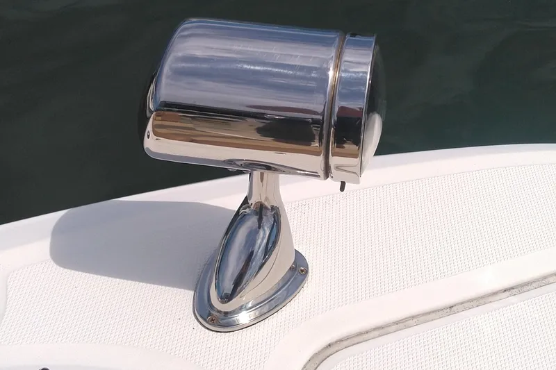 Slide: The Image of Chrome spotlight on 2014 Sea Ray 300 SLX boat deck. - 44