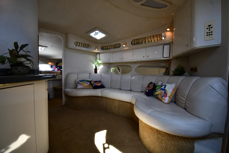 Slide: The Image of Luxurious interior of 1997 Sea Ray 400 Sundancer yacht with plush seating and elegant decor. - 38