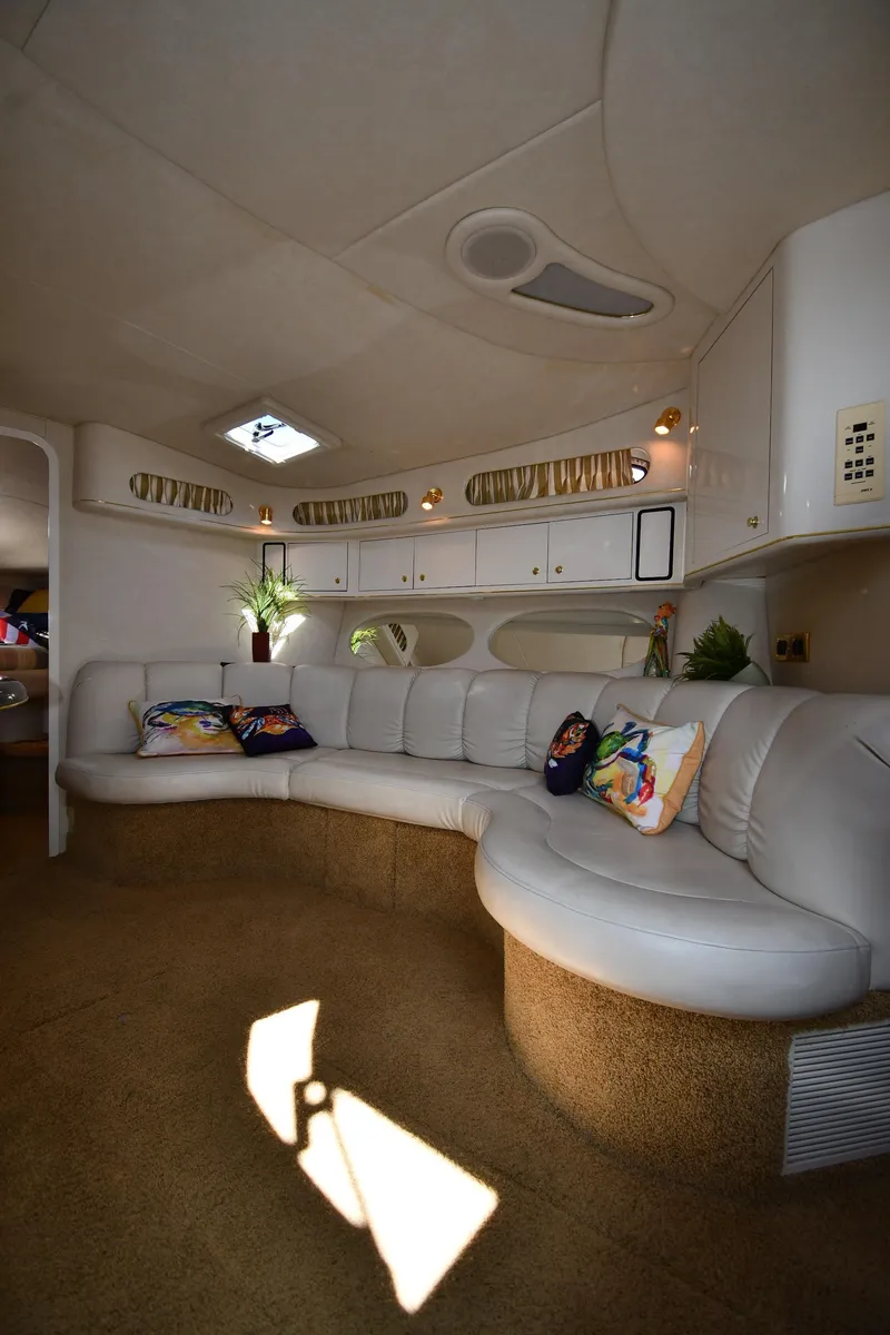 Slide: The Image of Luxurious interior of 1997 Sea Ray 400 Sundancer yacht with plush seating and elegant decor. - 39