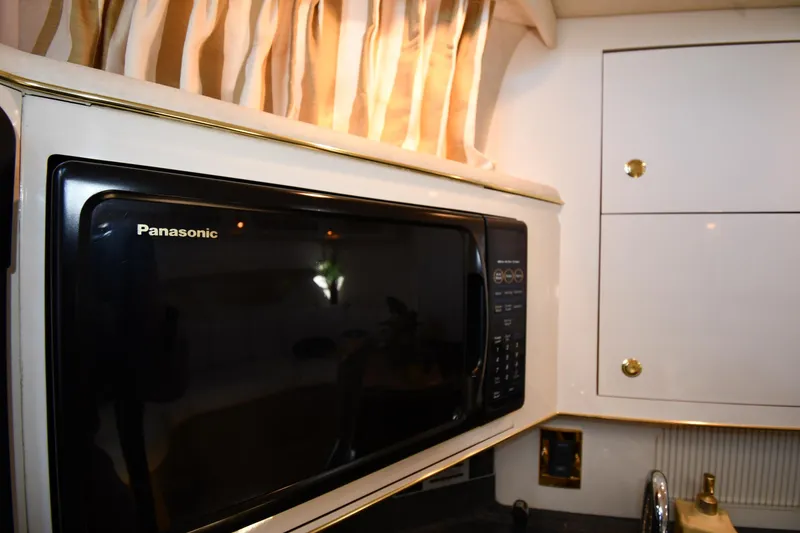 Slide: The Image of Panasonic microwave in 1997 Sea Ray 400 Sundancer yacht kitchen interior. - 48