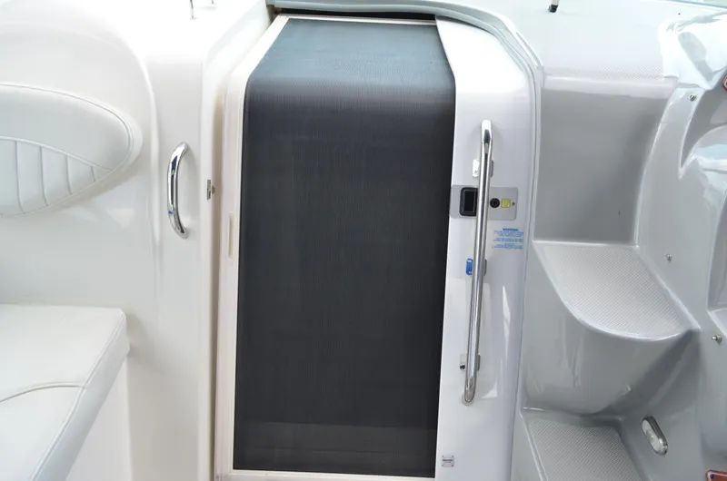 Slide: The Image of 2007 Bayliner 325 Sunbridge cabin entrance with sleek design and modern features. - 25