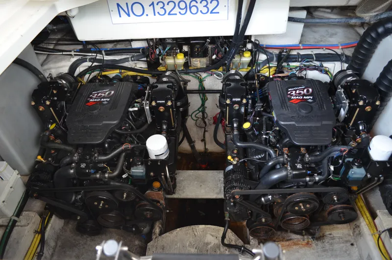 Slide: The Image of Engine compartment of a 2007 Bayliner 325 Sunbridge with twin MerCruiser 350 MAG MPI engines. - 40