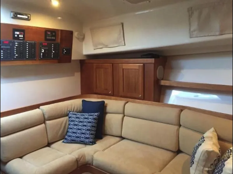 Slide: The Image of Cozy cabin interior of 2007 Back Cove 33 boat with comfortable bedding. - 12