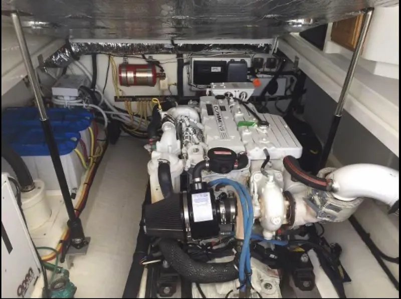 Slide: The Image of Shower area in 2007 Back Cove 33 boat, featuring a compact design and modern fixtures. - 14