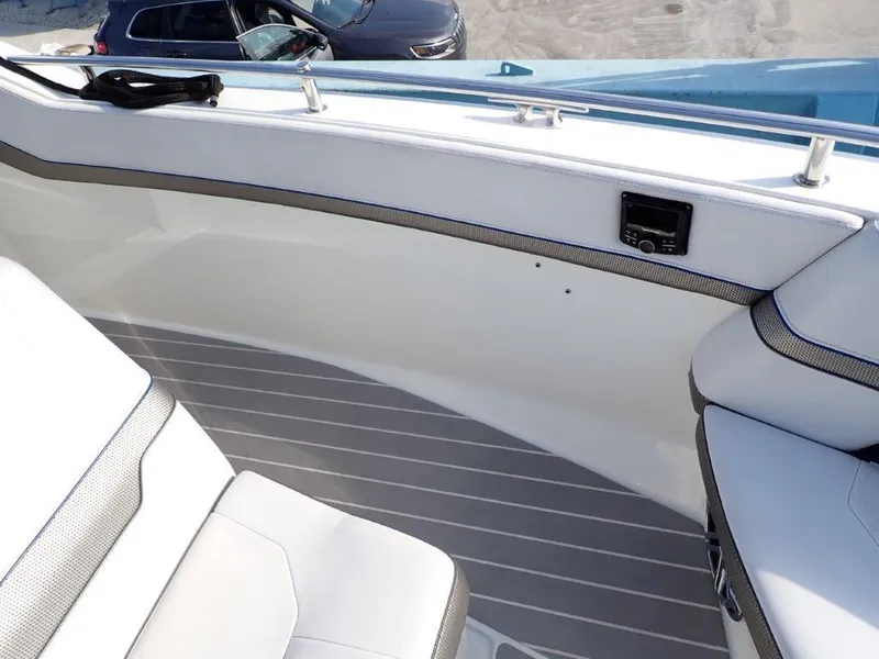 Slide: The Image of 2019 Formula 400 Super Sport Crossover interior with white seating and sleek design. - 20