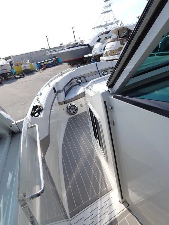 Slide: The Image of 2019 Formula 400 Super Sport Crossover yacht deck with sleek design and modern features. - 24