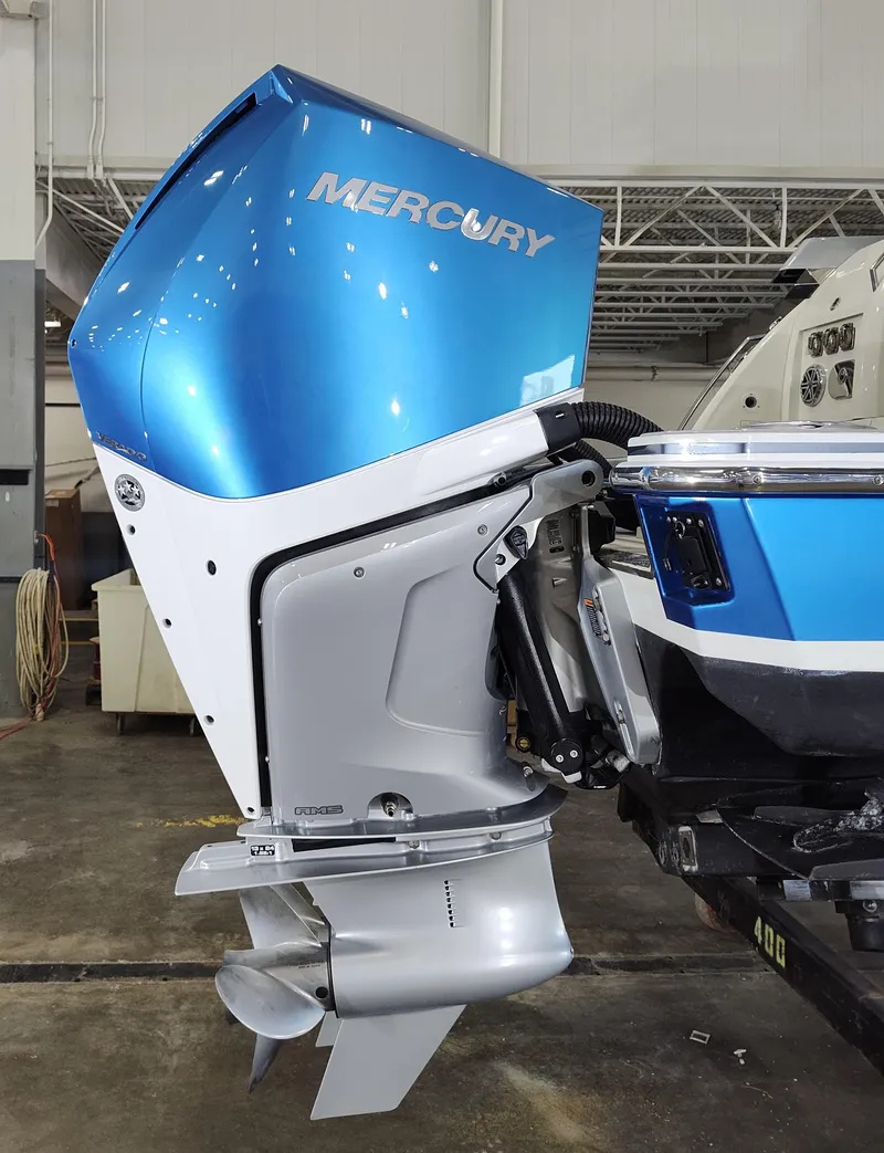 Slide: The Image of 2019 Formula 400 Super Sport Crossover with Mercury outboard engine in a showroom. - 4