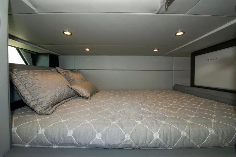 Slide: The Image of Interior cabin of 2019 Formula 400 Super Sport Crossover with cozy bed and ambient lighting. - 6