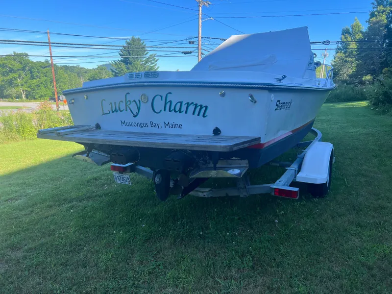 Slide: The Image of 1988 Shamrock 20 Cuddy boat named "Lucky Charm" on trailer, Muscongus Bay, Maine. - 2