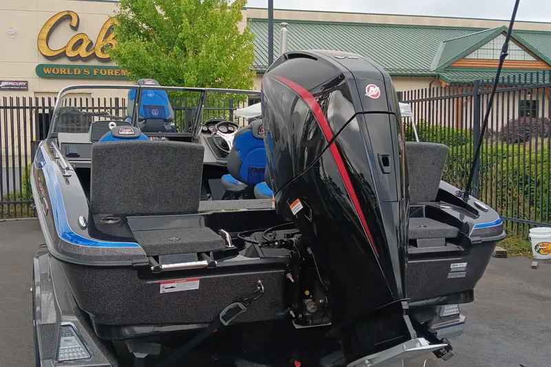 Slide: The Image of 2024 Ranger 1880MS boat with powerful outboard motor at Cabela's parking lot. - 5