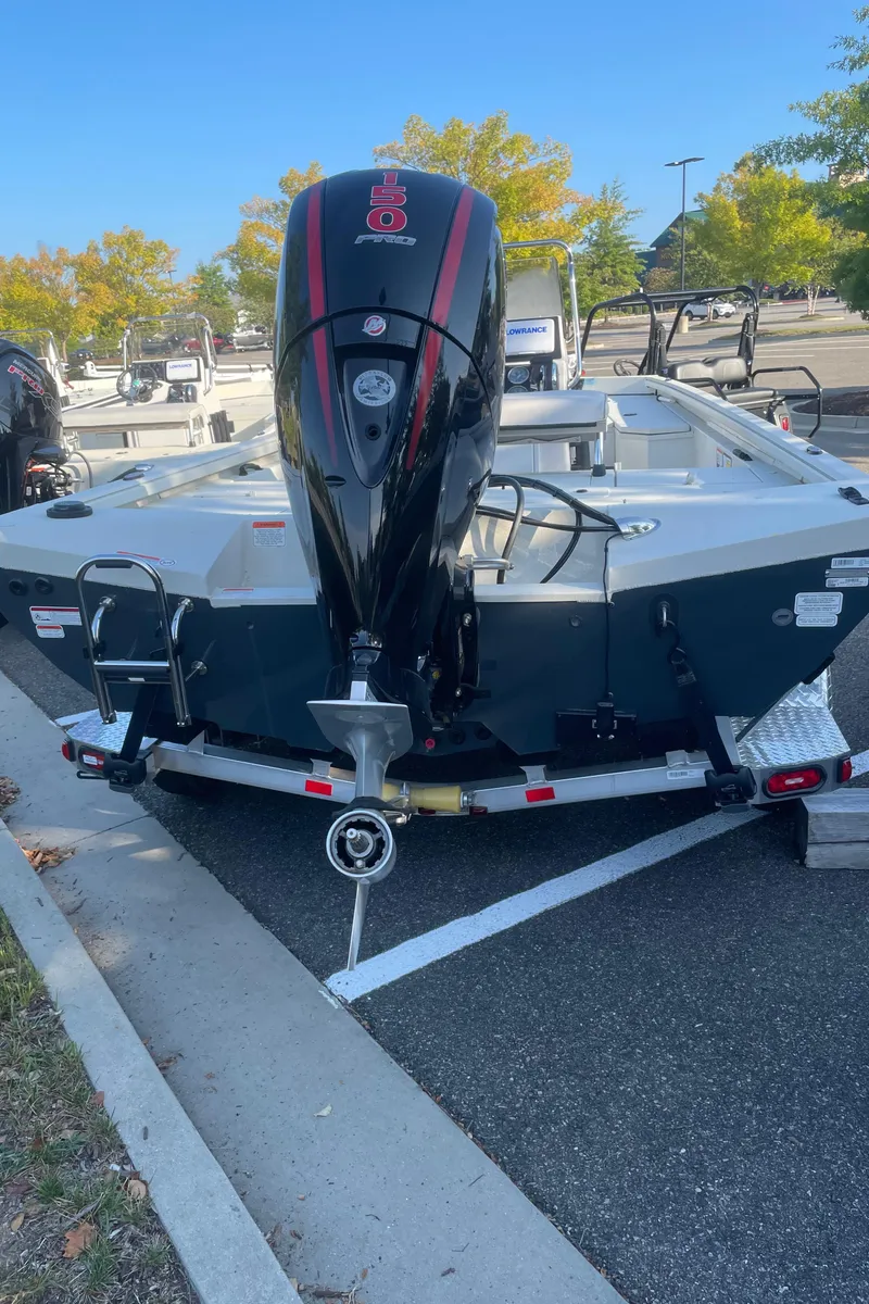 Slide: The Image of 2024 Ranger RB200 boat on trailer in parking lot. - 4
