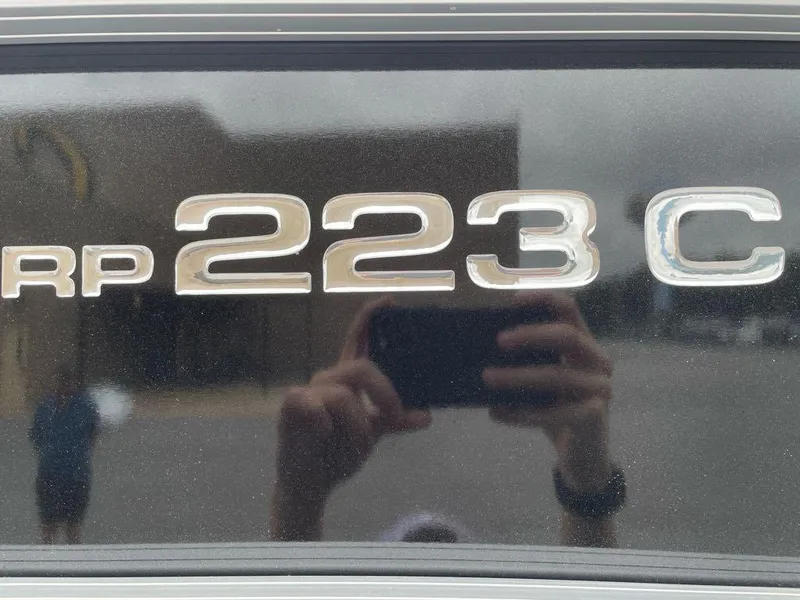 Slide: The Image of Close-up of Ranger Reata 223C 2024 model emblem with reflection. - 2