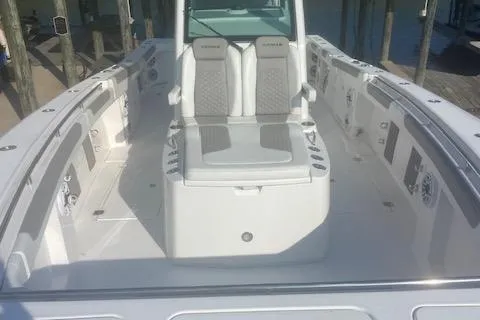 Slide: The Image of 2024 Caymas 30CAT boat interior with dual seating and sleek design. - 10