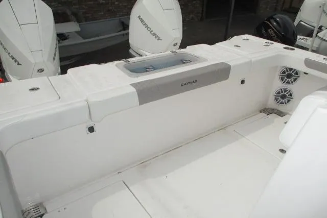 Slide: The Image of 2024 Caymas 30CAT boat interior with Mercury engines and speaker system. - 14