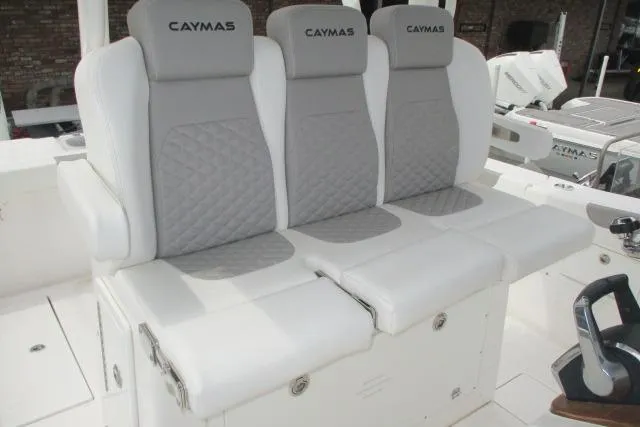 Slide: The Image of 2024 Caymas 30CAT boat seating with gray and white cushioned design. - 15