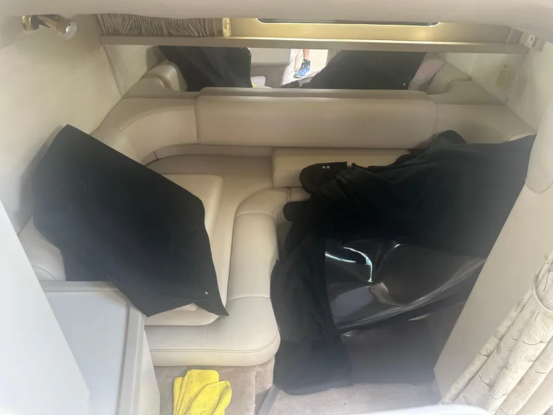 Slide: The Image of Interior of a 2000 Formula 31 Performance Cruiser with beige leather seating. - 11