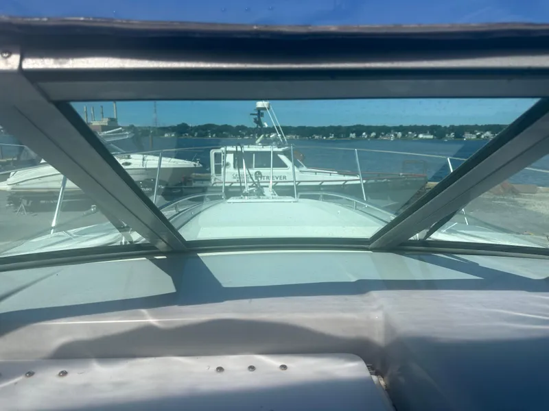 Slide: The Image of View from a 2000 Formula 31 Performance Cruiser overlooking the harbor. - 12
