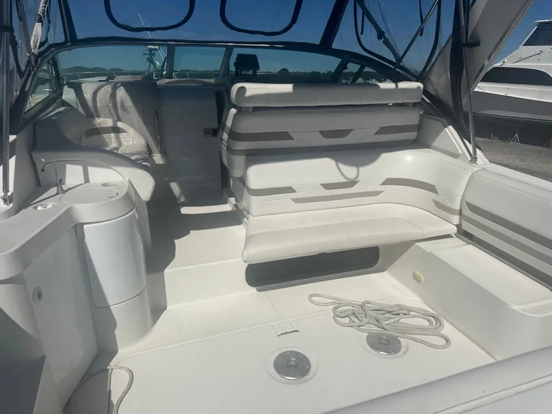 Slide: The Image of Interior of a 2000 Formula 31 Performance Cruiser with seating area. - 4