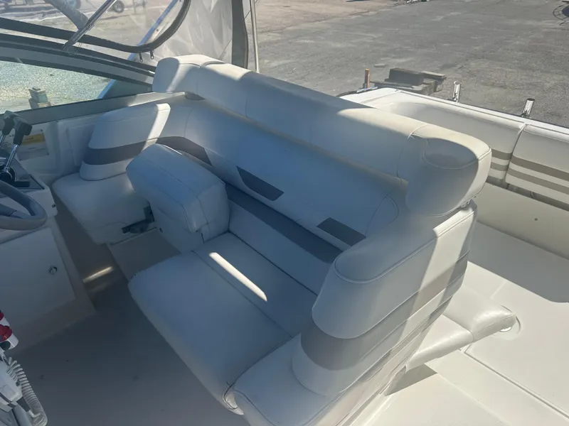 Slide: The Image of Interior of a 2000 Formula 31 Performance Cruiser with white seating. - 5