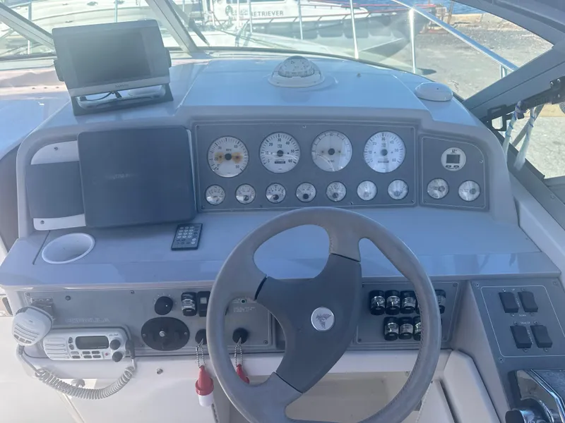 Slide: The Image of Dashboard of a 2000 Formula 31 Performance Cruiser. - 7