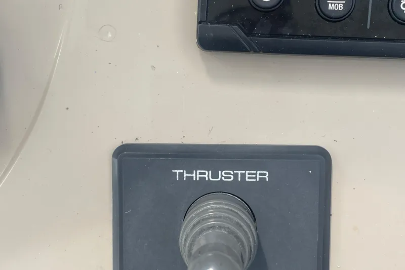 Slide: The Image of Thruster control panel on 2009 Sea Ray 40 Sundancer yacht. - 14