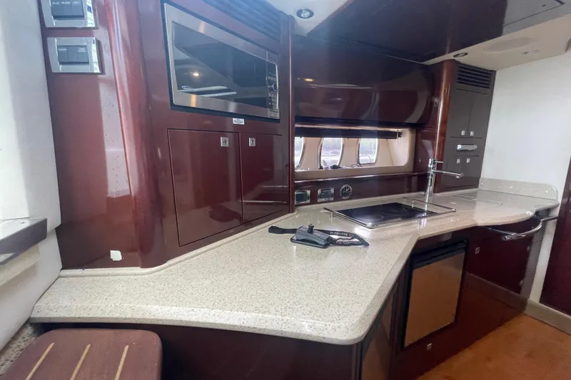 Slide: The Image of Luxurious kitchen area in 2009 Sea Ray 40 Sundancer yacht with modern amenities. - 20