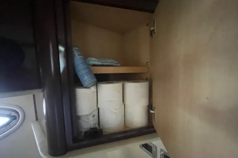 Slide: The Image of Cabinet storage in 2009 Sea Ray 40 Sundancer yacht bathroom. - 29