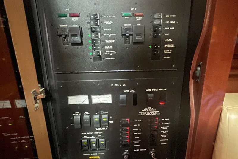 Slide: The Image of Electrical control panel on a 2009 Sea Ray 40 Sundancer yacht. - 39