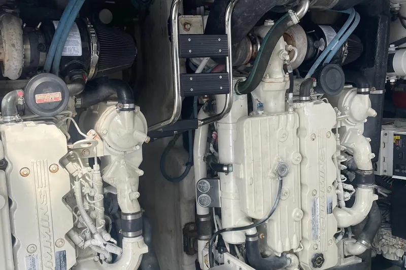 Slide: The Image of Engine room of 2009 Sea Ray 40 Sundancer with twin diesel engines. - 42