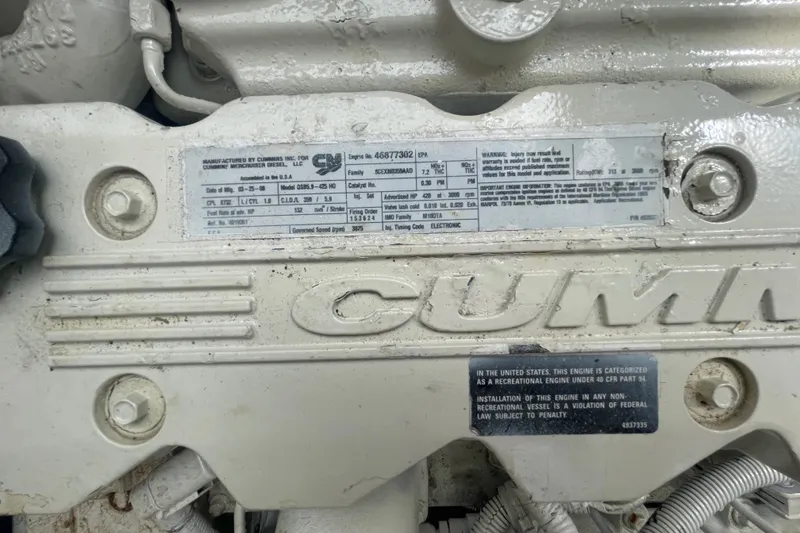 Slide: The Image of Close-up of Cummins engine label on 2009 Sea Ray 40 Sundancer. - 45