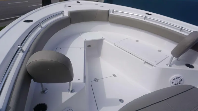 Slide: The Image of 2025 Sportsman 212 Open boat interior with cushioned seating and storage compartments. - 4