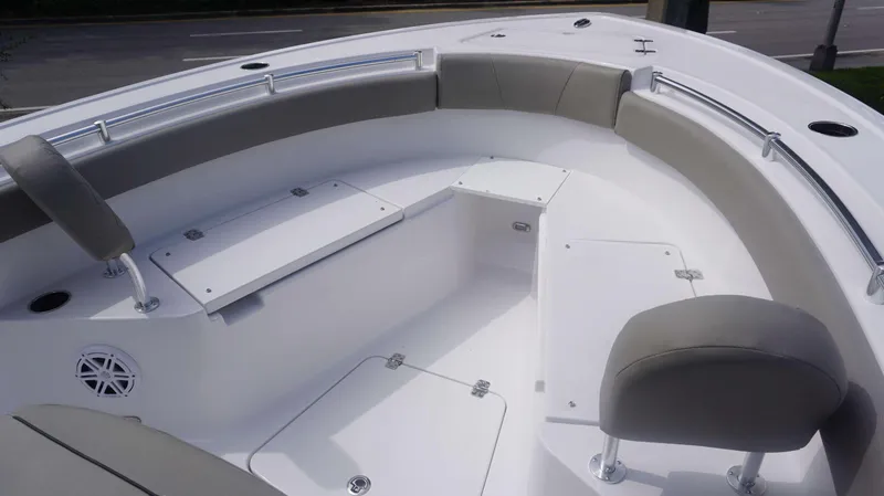 Slide: The Image of 2025 Sportsman 212 Open boat interior with cushioned seating and storage compartments. - 5